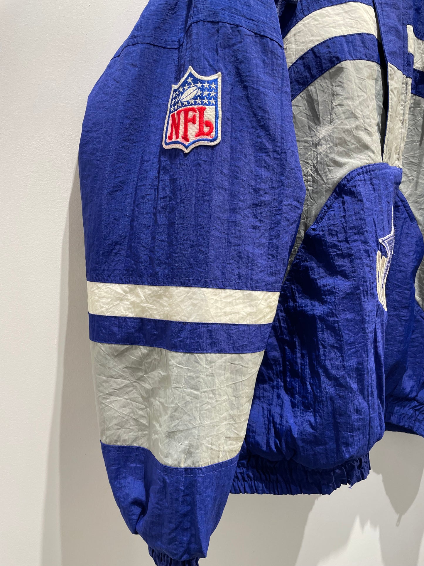 【古着】90's NFL ダラス・カウボーイズ Dallas Cowboys ナイロン 中綿 ハーフジップ アノラック ジャケット ブルー 青