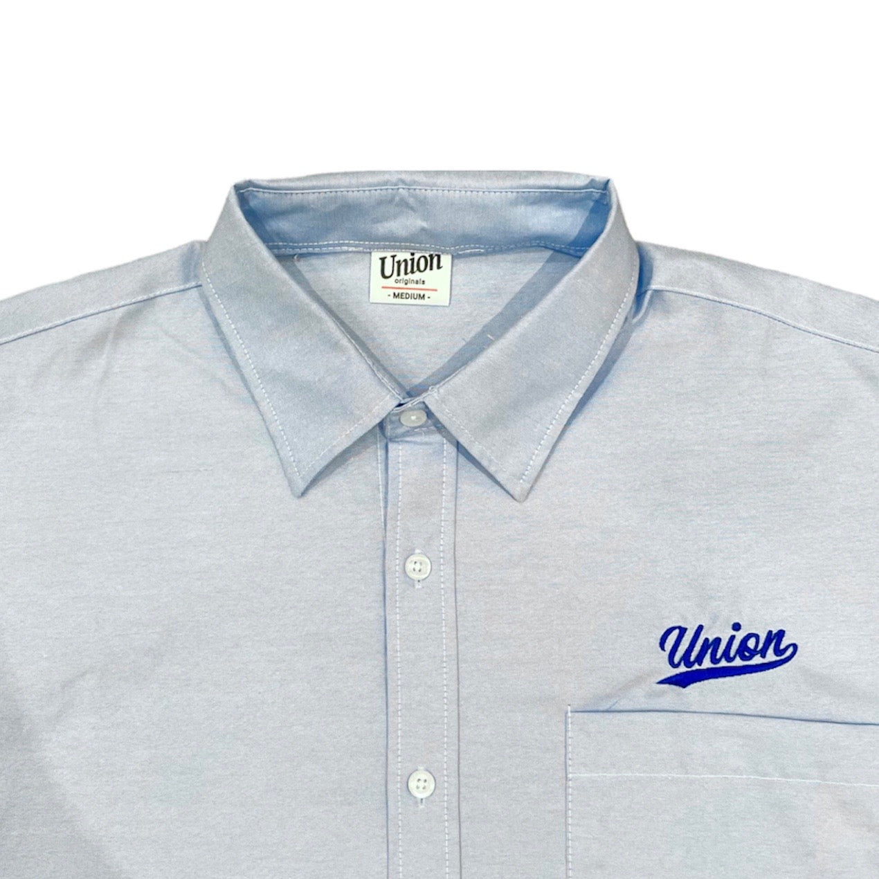 【UNION originals - ユニオンオリジナルス】League Logo Oxford Shirt / Light Blue (リーグロゴ オックスフォードシャツ/ライトブルー)
